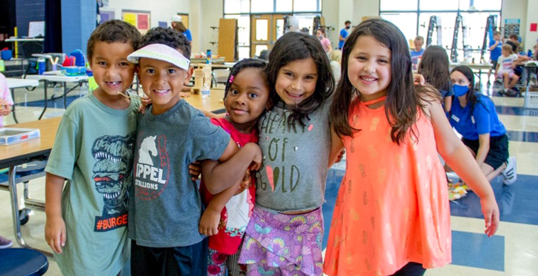 smiling children posing together