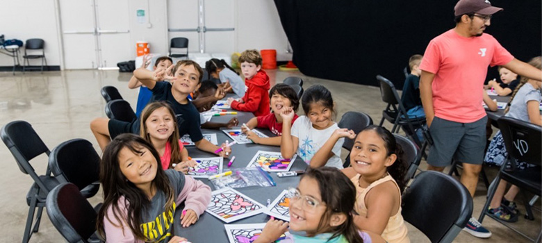 Children doing arts and crafts at a YMCA Summer Camp