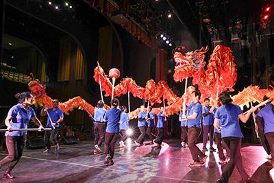 dragon dance performed by the San Antonio Chinese Alliance and a Native American hoop dance by Eric Michael Hernández of the Lumbee Tribe