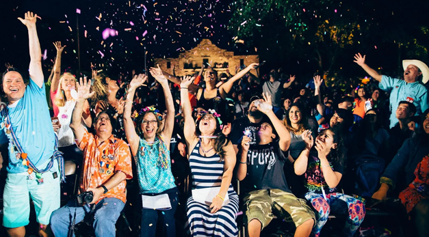 Photo of students enjoying the Fiesta Flambeau Night Parade