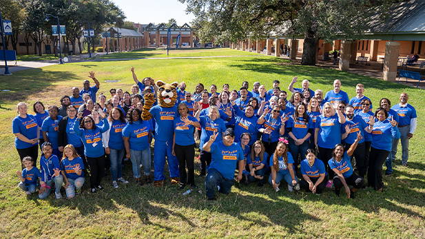 Tiger Nation Family Day - Five students posing together smiling